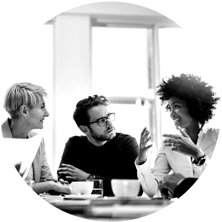 Professionals engaged in a team discussion during an OKR consulting session