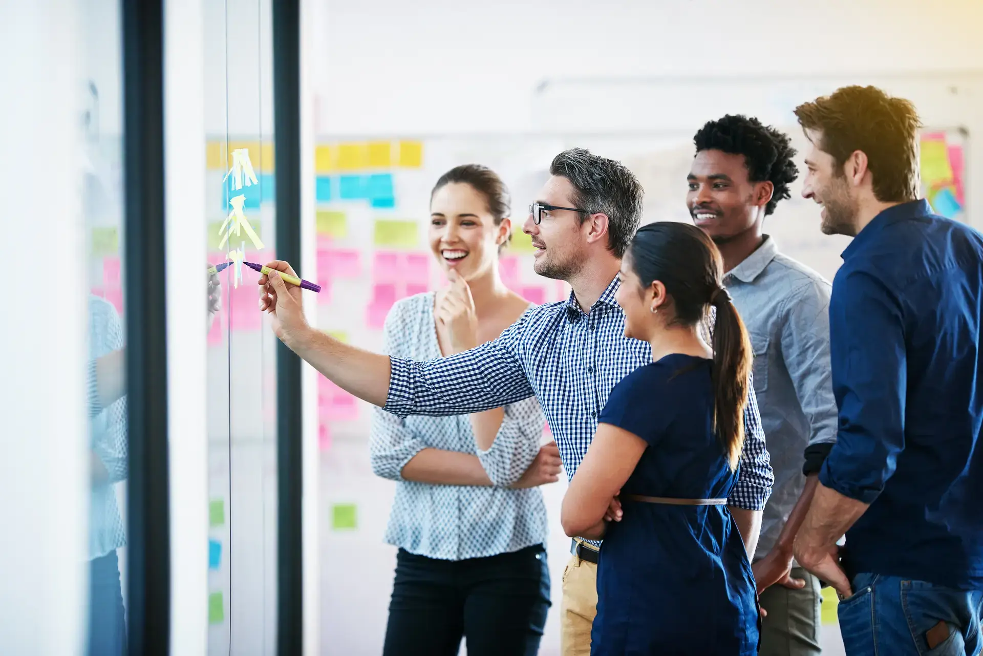 OKR consultant providing guidance to a team during a strategic planning session