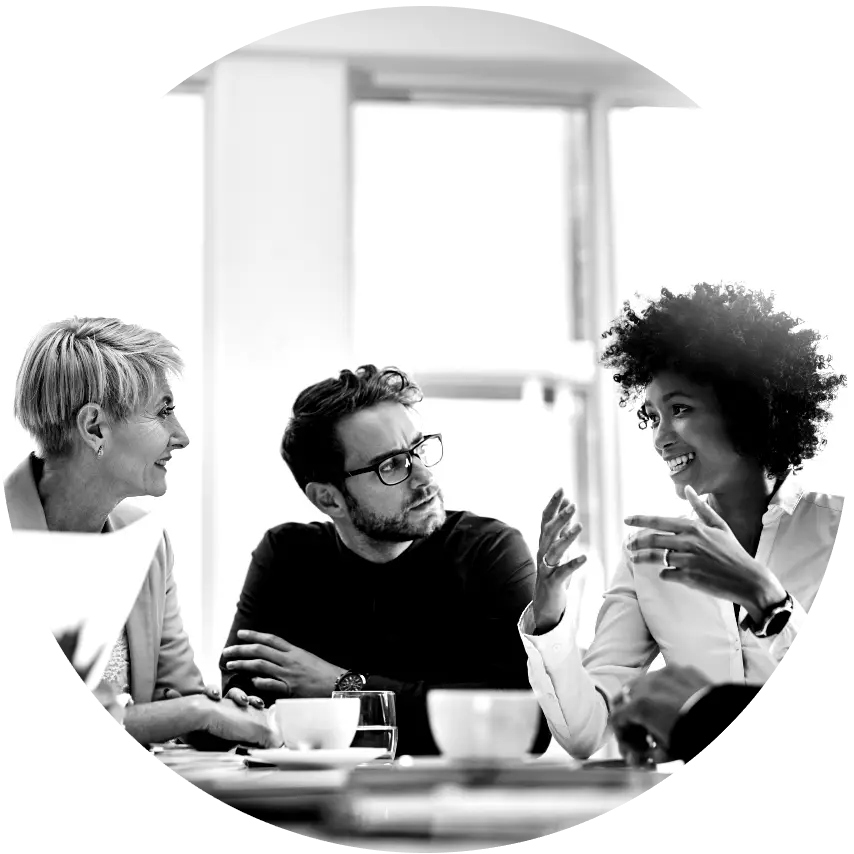 Professionals engaged in a team discussion during an OKR consulting session